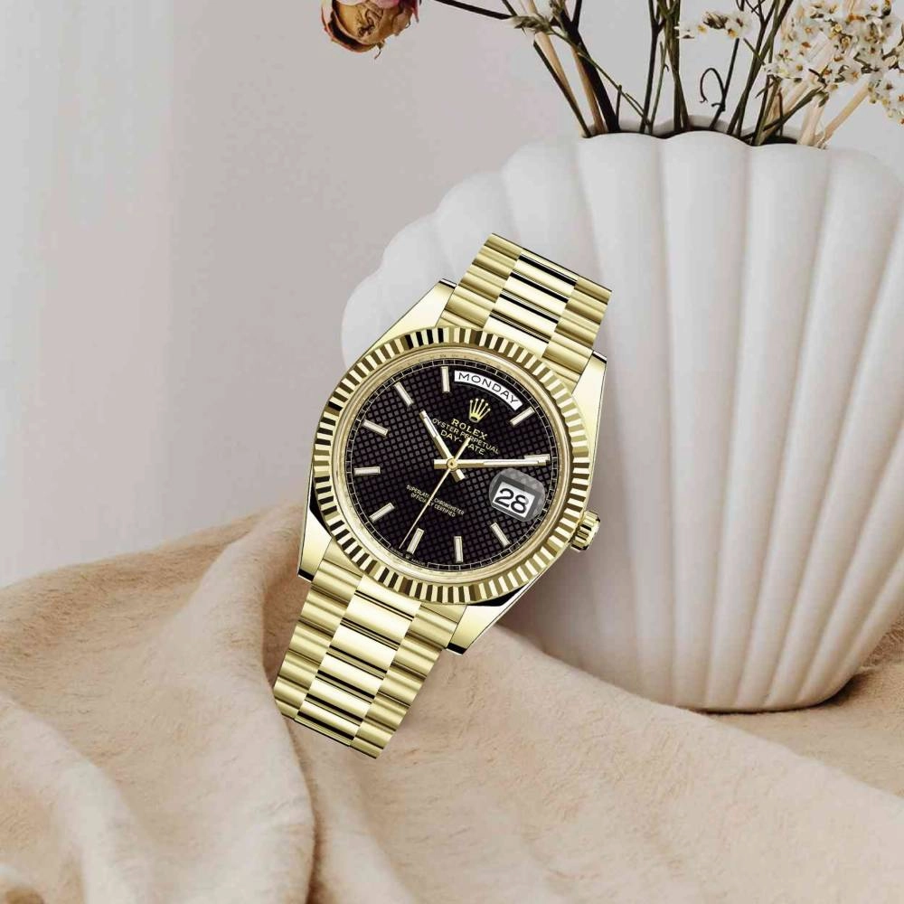 Rolex Day Date 40mm - Ref: 228238-0007 - Black Diagonal Motif Dial & Fluted Bezel, 18K Yellow Gold President Bracelet Men's Watch